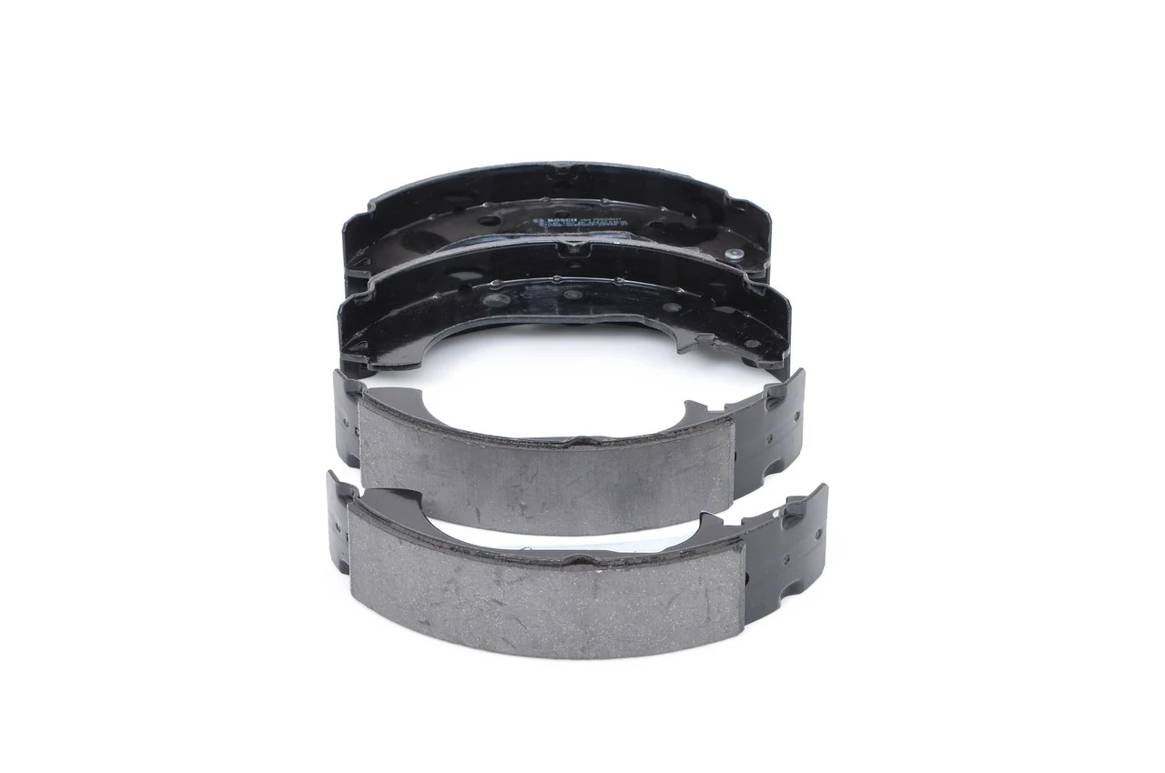 Купить 0986487957 Bosch Колодки ручника/стояночного тормоза